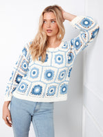 With long sleeves, this sweater is perfect for cooler days while maintaining a chic appearance by Charlie B.