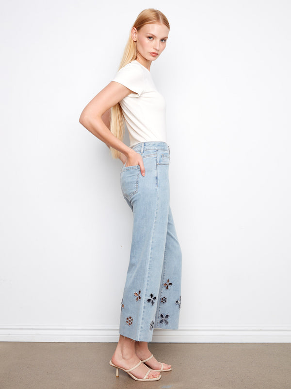 Jeans in light blue with a five-pocket design, offering both style and practicality, adorned with floral cutouts by Charlie B.