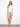 Embroidered white top with a crew neckline, perfect for casual elegance by Charlie B.