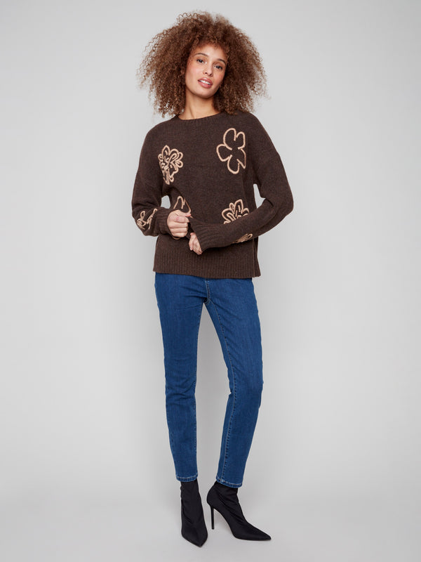 Chic heather brown sweater showcasing an embroidered floral design and ribbed hem, perfect for any casual outing by Charlie B.