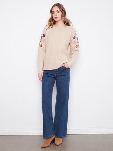 Enjoy the ribbed cuffs and hem of this cozy knit sweater, perfect for any casual outing. By Charlie B.