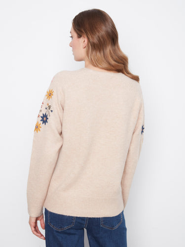 A delicate balance of style and comfort, highlighted by exquisite floral embroidery on soft fabric. By Charlie B.