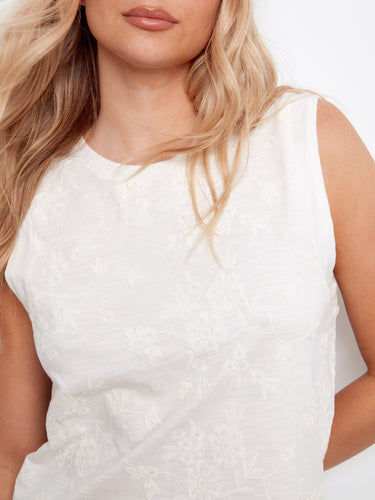 Sophisticated design with a focus on floral embroidery, this sleeveless top pairs effortlessly with the classic crew neckline. By Charlie B.