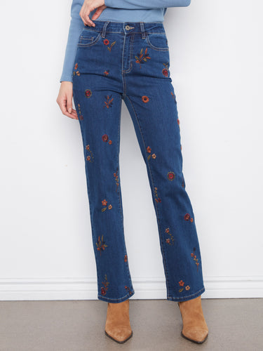 These jeans feature a regular rise, ensuring comfort and style for everyday wear. Perfect addition to any closet. By Charlie B.
