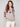 Heather taupe sweater with floral embroidery, featuring a drop shoulders design and ribbed cuffs by Charlie B.