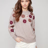Heather taupe sweater with floral embroidery, featuring a drop shoulders design and ribbed cuffs by Charlie B.
