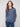Stylish sweater crafted from soft fabric, highlighted by ribbed cuffs and beautiful floral detailing by Charlie B.