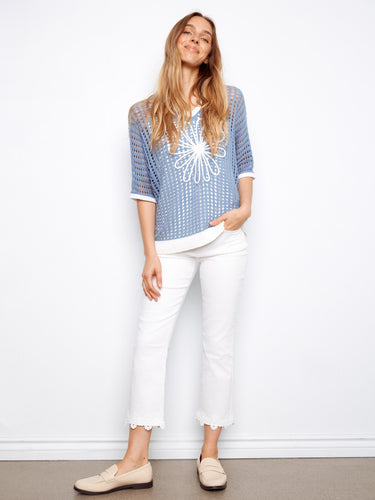 Chic knit top with elbow dolman sleeves and floral design, offering a relaxed fit for ultimate comfort by Charlie B.