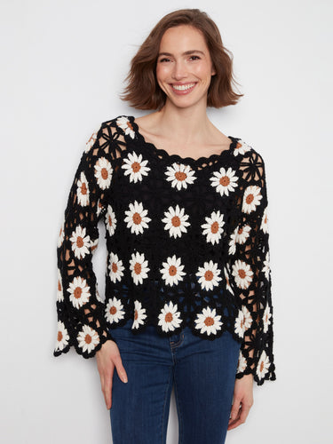 Long sleeves complement the delicate handcrafted design of this charming floral crochet blouse. By Charlie B.