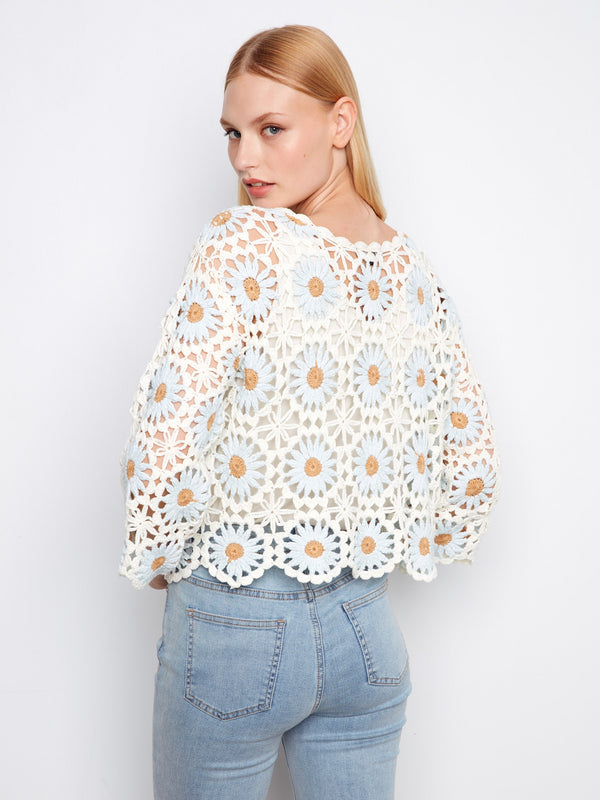 Beautiful scalloped hem adds a touch of grace to this floral crochet sweater, perfect for any occasion by Charlie B.