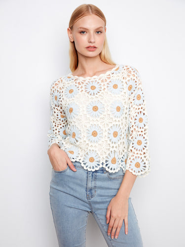 This exquisite hand-crochet design brings artistry to your outfit, offering both comfort and style by Charlie B.