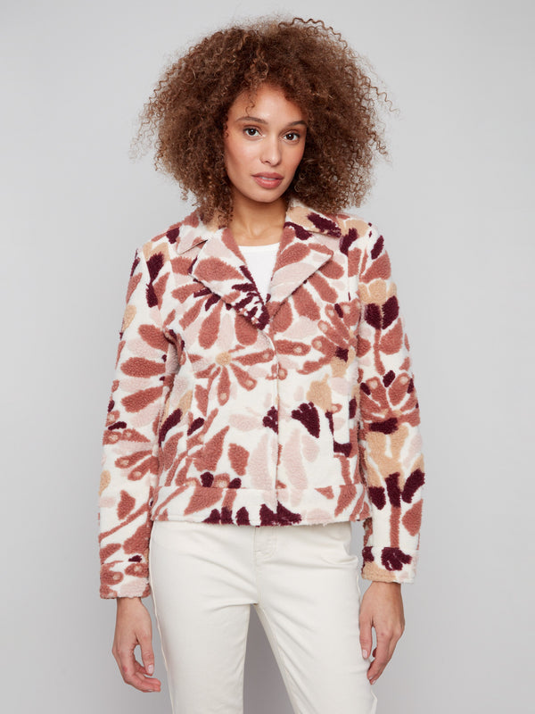 Elegant cabernet floral short coat with functional welt pockets for a practical yet stylish look by Charlie B.
