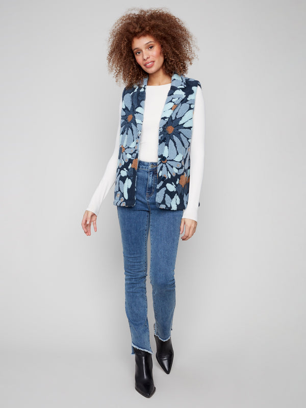 Blue floral vest featuring cozy Sherpa fleece and elegant spread collar, perfect for layering by Charlie B.