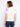Elegant white top crafted from pure cotton, showcasing beautiful floral details on the sleeves for a chic look by Charlie B.