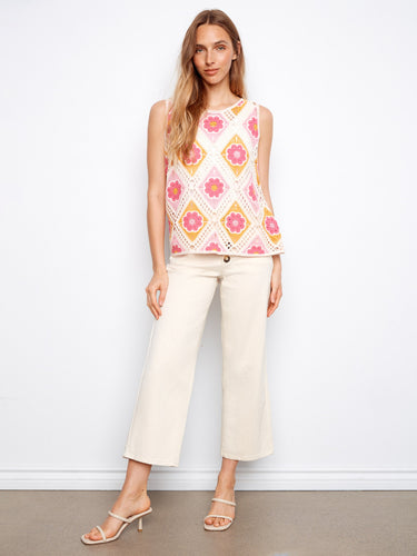 This sleeveless design showcases vibrant floral patterns, offering both comfort and elegance. Ideal for sunny adventures by Charlie B.