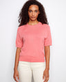 Pink top featuring a crew neckline, highlighted by delicate applique embroidery for a touch of elegance. Crafted in 100% cotton by Charlie B.
