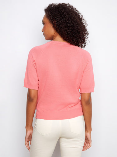 Experience the comfort of 100% cotton with this pink top, featuring stylish raglan sleeves for a modern look by Charlie B.