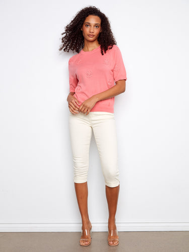 Embrace the classic crew neckline on this pink top, perfect for any occasion. Enjoy the softness of 100% cotton by Charlie B.