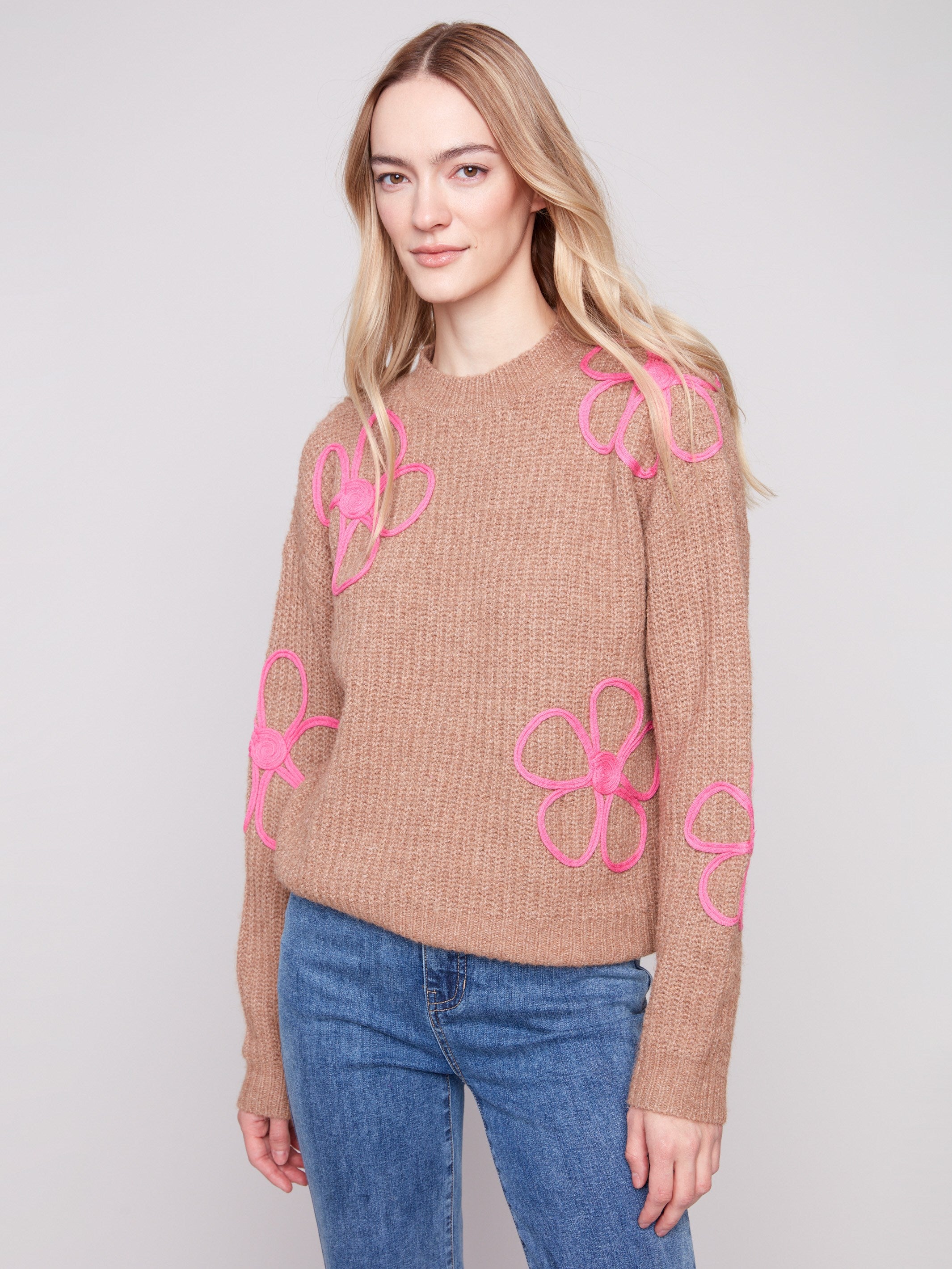 Heather Truffle sweater with vibrant pink floral accents and a cozy drop shoulder design. Perfect for casual elegance by Charlie B.
