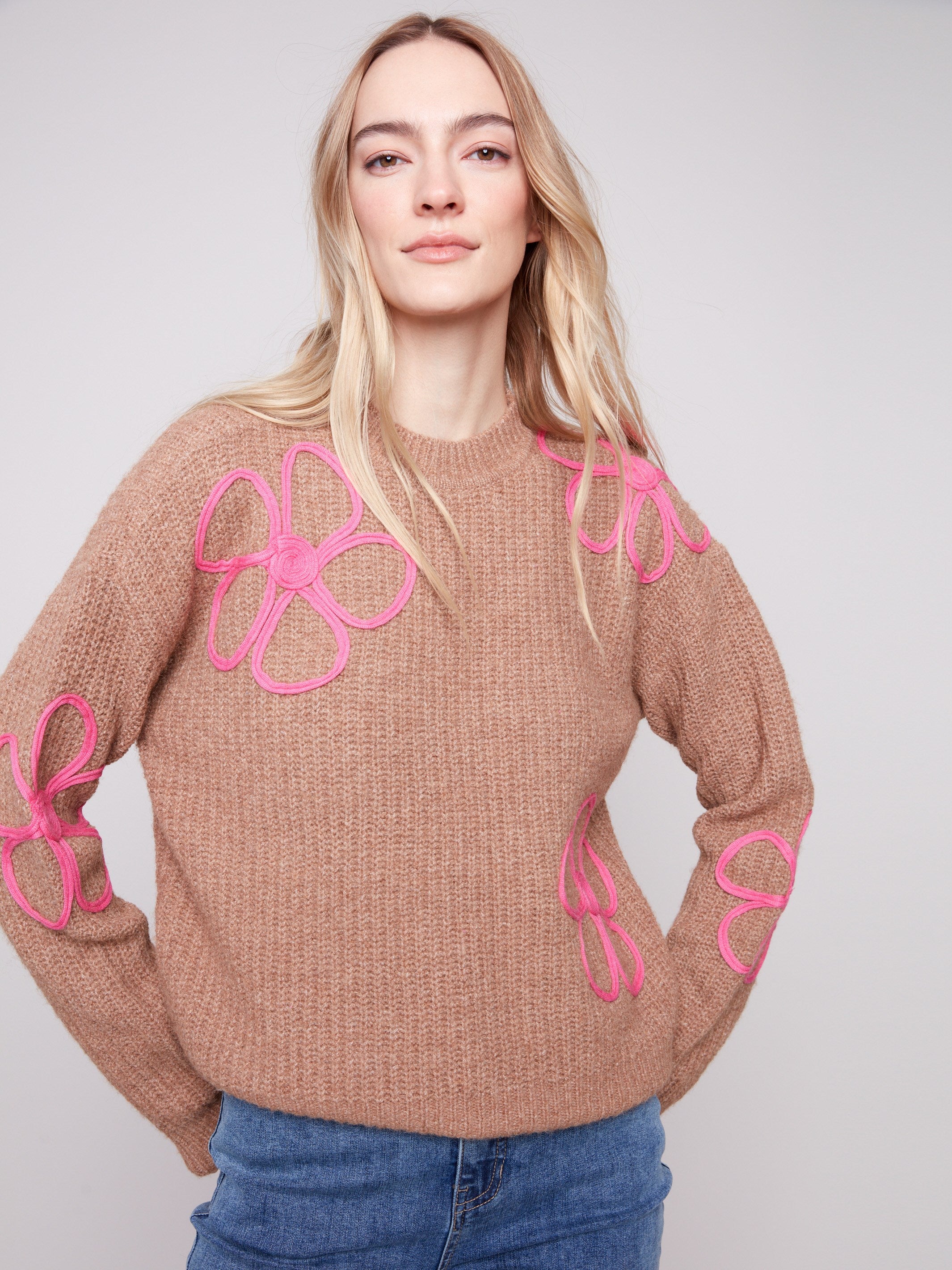 Soft crew neck sweater in Heather Truffle adorned with intricate floral soutache detailing, offering timeless style by Charlie B.