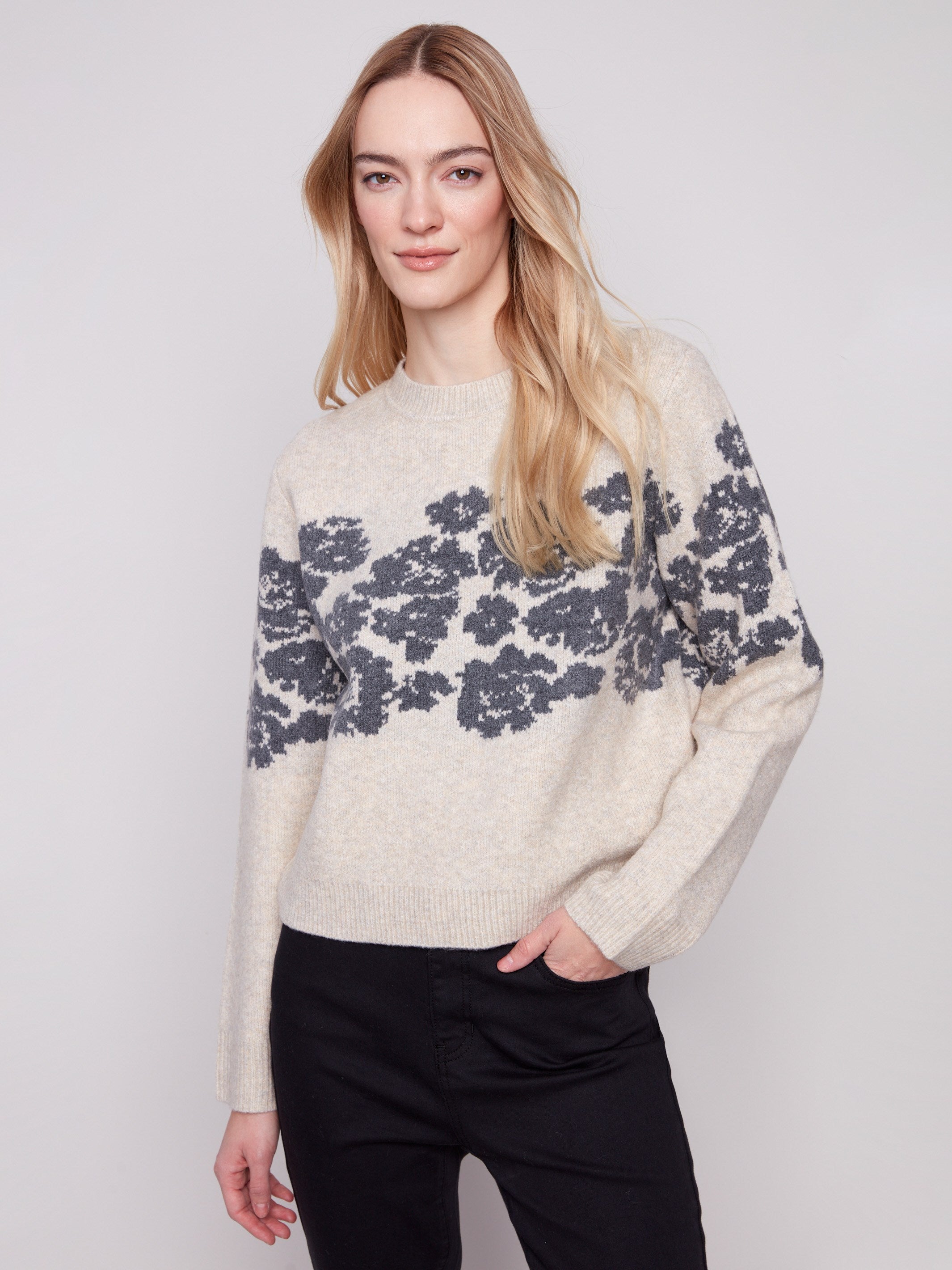 Vanilla sweater with floral jacquard pattern, featuring a stylish crew neck design for a versatile look by Charlie B.