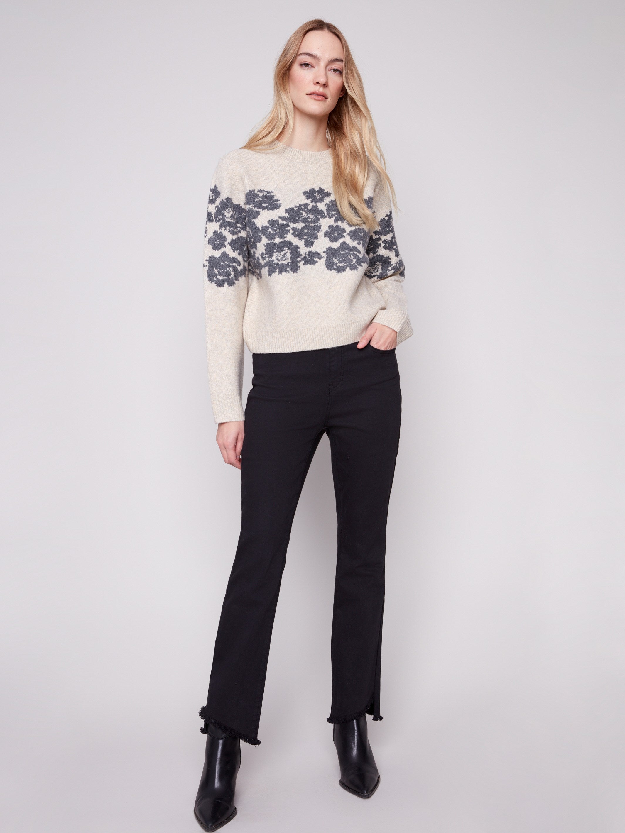 Elegant relaxed fit sweater in heather vanilla with floral jacquard detailing, perfect for any occasion by Charlie B.