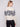 Chic knit cuffs add a touch of sophistication to this heather vanilla sweater with floral jacquard accents by Charlie B.