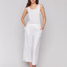 Champagne pants featuring a high-rise waist and elastic at back waistband by Charlie B.