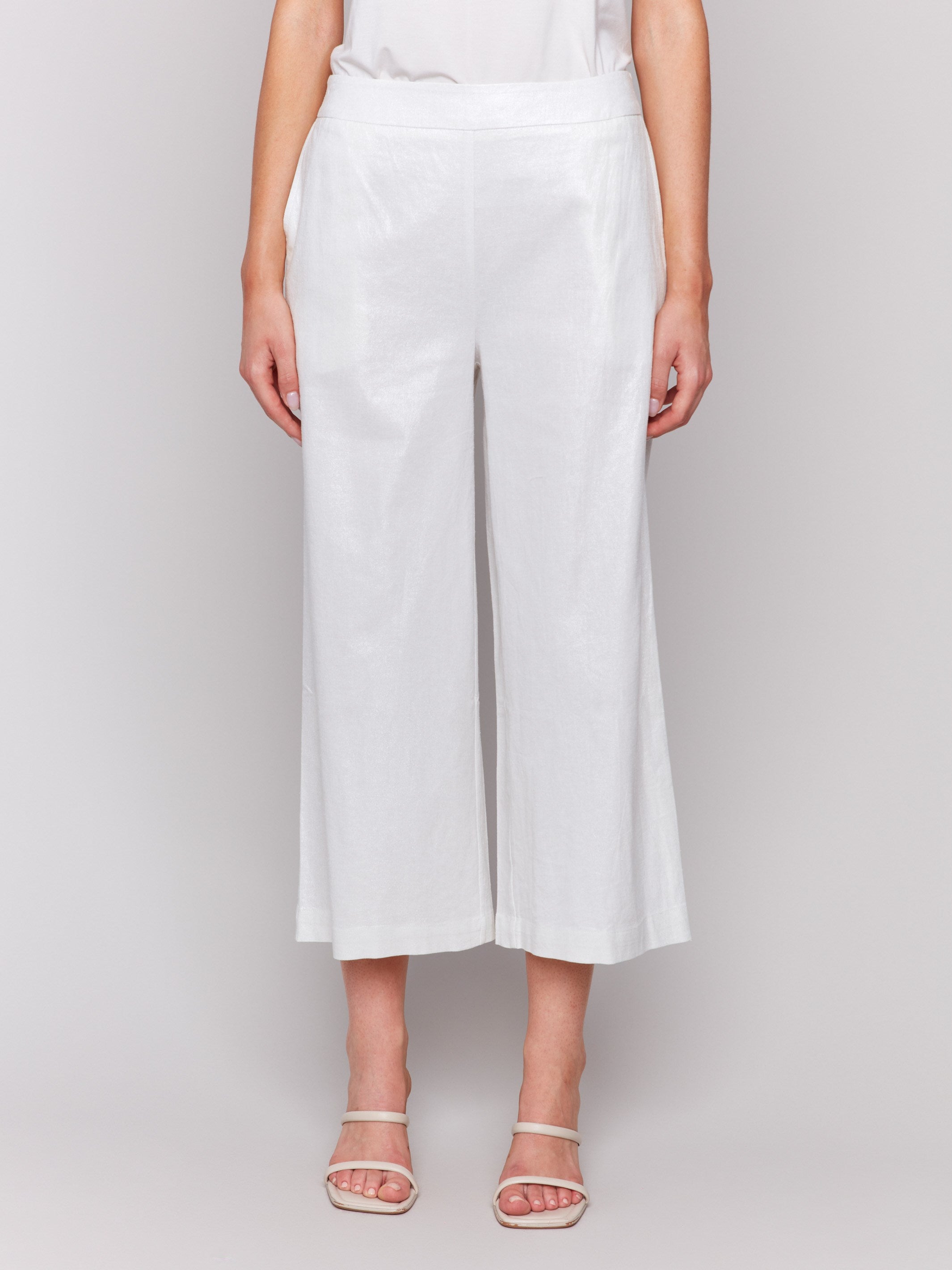 Champagne pants designed with a cropped length and stretch fabric by Charlie B.