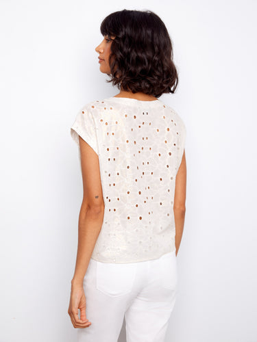 Cotton eyelet blouse with elegant cap sleeves and a trendy tie front detail for a modern finish by Charlie B.