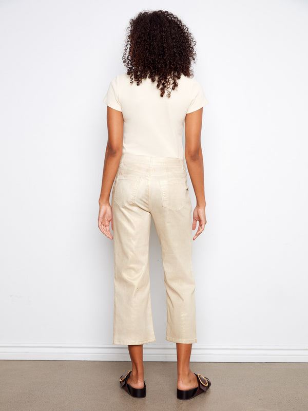 Natural foiled cropped pants designed with practicality in mind, featuring functional patch pockets by Charlie B.