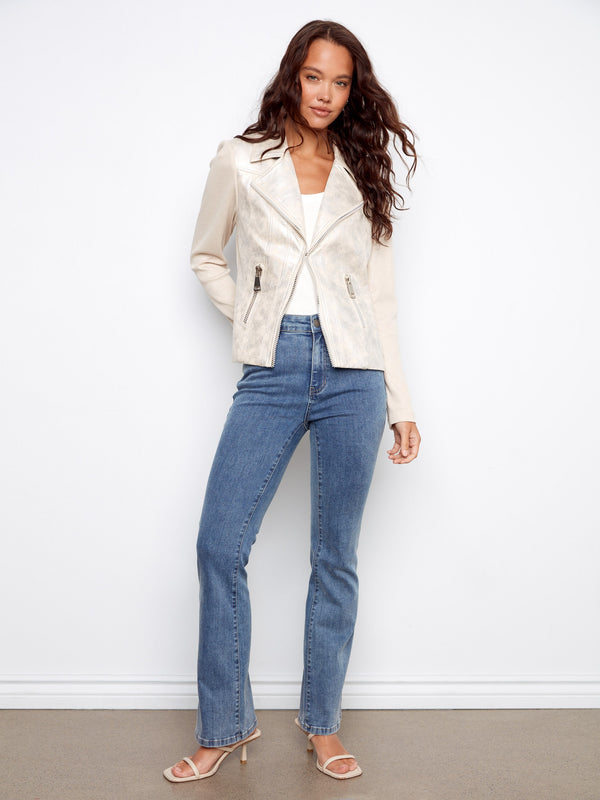 Crafted from foiled faux leather, this jacket exudes contemporary elegance by Charlie B.