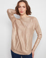 Sweater featuring a chic boat neck design and metallic finish, perfect for adding a touch of elegance to any outfit. By Charlie B.