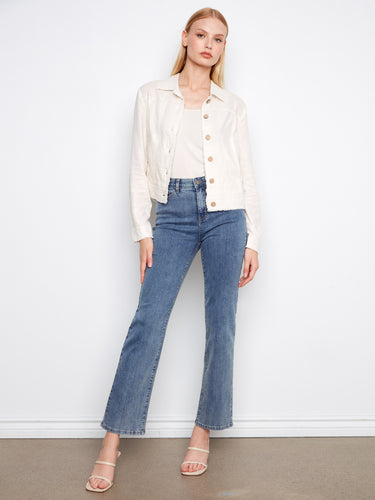 Front button closure enhances the classic appeal of this champagne linen blend jacket by Charlie B.