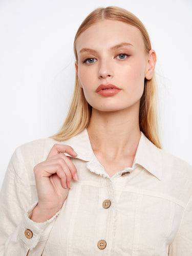Functional front pockets make this champagne foil print jacket both stylish and practical by Charlie B.