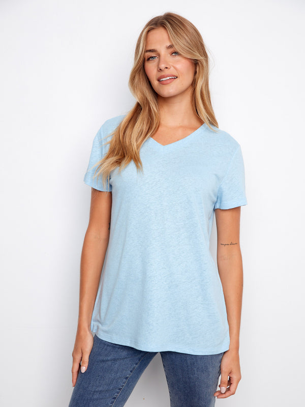 A light blue T-shirt with a flattering V-neck design, perfect for casual outings. The relaxed fit ensures comfort all day by Charlie B.