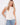 This top features a stylish scoop neckline, perfect for any casual outing. Designed by Charlie B.