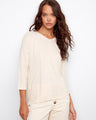 Elegant V-neck top with a relaxed fit, perfect for casual outings. By Charlie B.