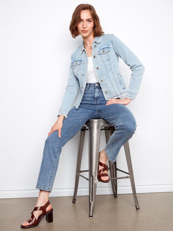 Crafted from stretch denim, this jacket offers comfort and flexibility while maintaining its chic look by Charlie B.
