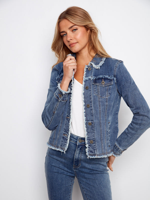 This denim jacket boasts two front patch pockets for added functionality and style. A versatile piece crafted by Charlie B.