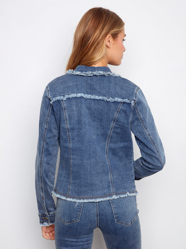 Front patch pockets add utility to this stylish denim jacket, blending practicality with fashion effortlessly. Created uniquely by Charlie B.