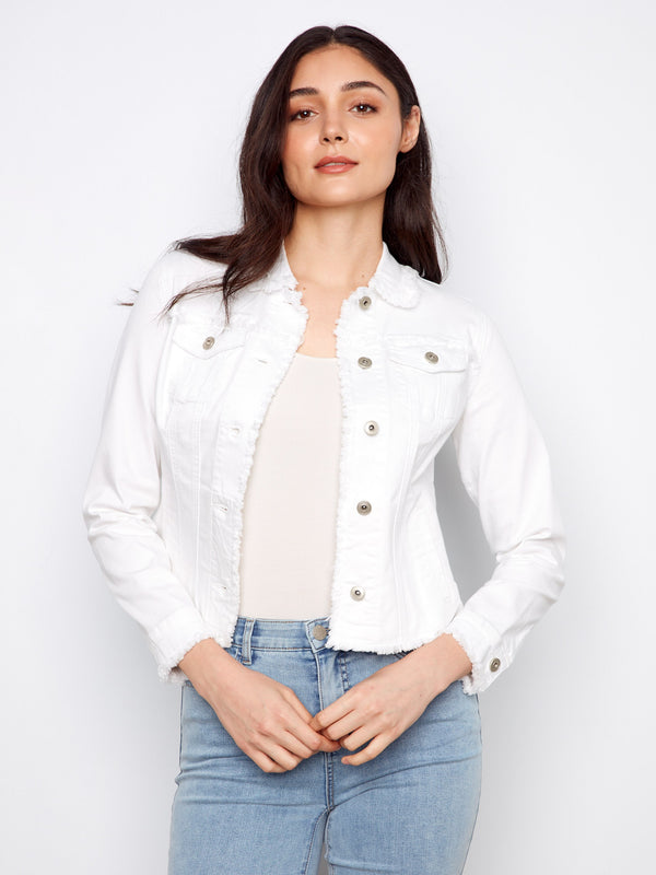 Featuring two front patch pockets, this white jean jacket combines practicality with chic design by Charlie B.