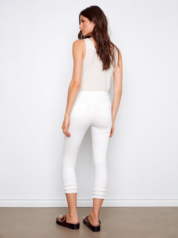 White cropped twill pants with five pockets and stretch fabric offer both style and functionality by Charlie B.