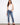 Blue skinny denim pants with a regular rise, featuring a stylish frayed hem by Charlie B.