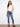 Blue skinny denim pants with a regular rise, featuring a stylish frayed hem by Charlie B.