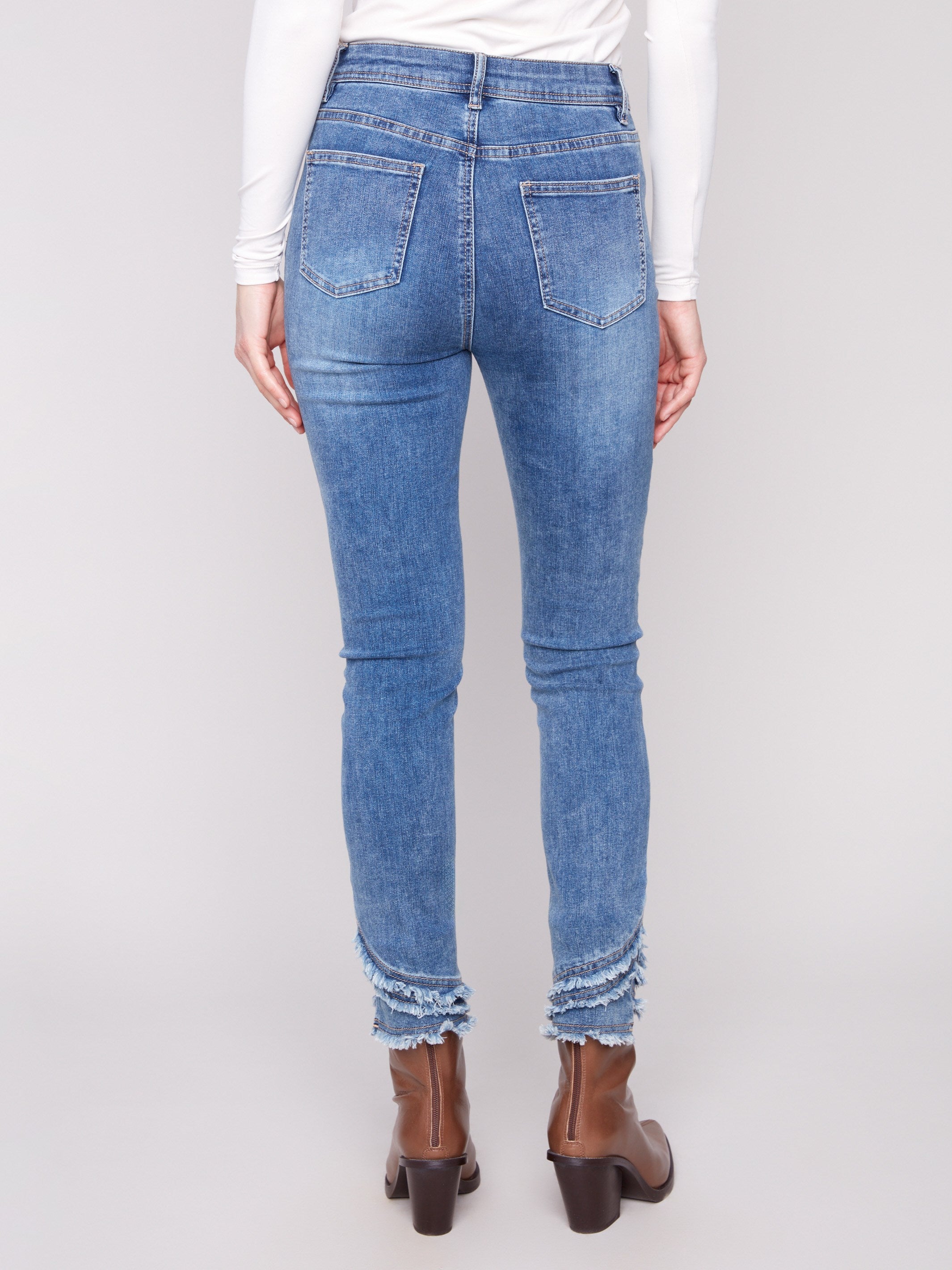 Featuring a regular rise waist, these jeans ensure a flattering silhouette and versatile styling by Charlie B.