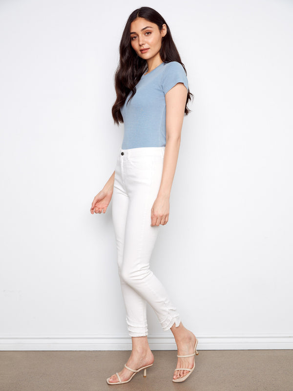 Experience the convenience of a five-pocket design with these stylish pants, perfect for any occasion. By Charlie B.