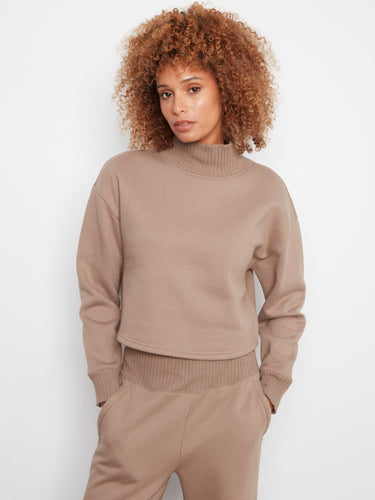 Experience the comfort of this cotton blend top, designed with attention to detail. Ideal for everyday elegance by Charlie B.