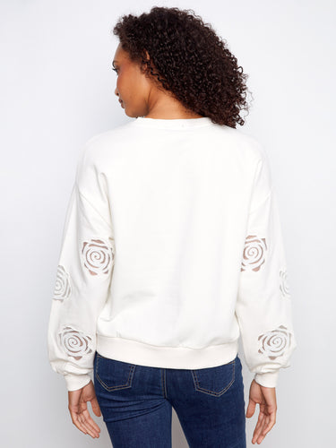 Designed with stretch cotton fabric, this sweater ensures comfort while maintaining its chic appearance by Charlie B.