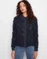 Navy chiffon blouse featuring a classic shirt collar, enhancing its elegant appeal. Perfect for both casual and formal occasions by Charlie B.